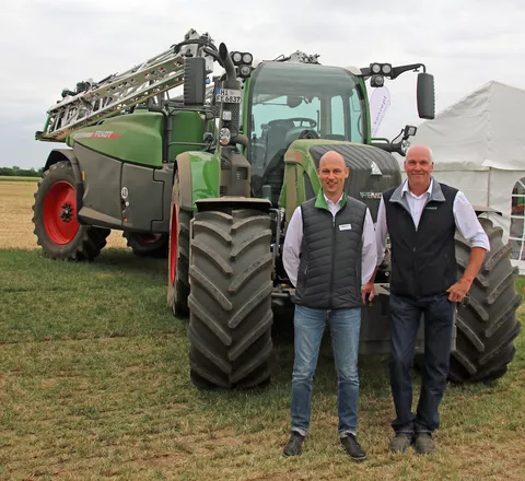 Fendt employees Jochen Buhrmester (left) and Thomas Fischer (right) on the Rogator 300 trailed sprayer.