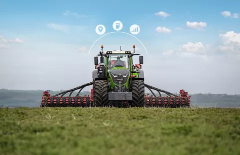 Fendt 1000 Vario driving across field with cultivator with three digitally added icons to Fendt Connect