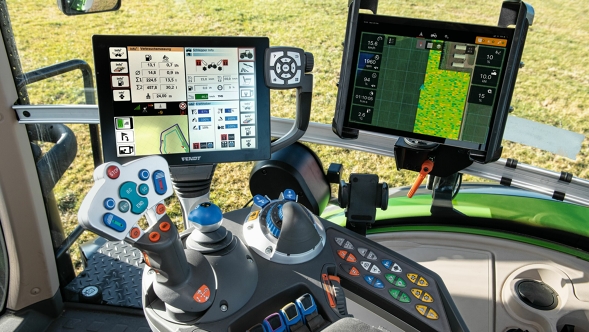 Interior view of a driver's cab with various electronics, screens and solutions