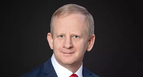 Kelvin Bennett (Senior Vice President of Engineering at AGCO) in portrait mode in front of a black background