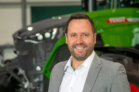 Wolfgang Möhrer (Director Fendt Sales in Germany) in front of a Fendt tractor