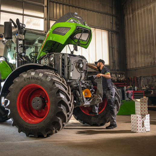 A Fendt 700 Vario Gen6 tractor for a check-up in a dealer workshop