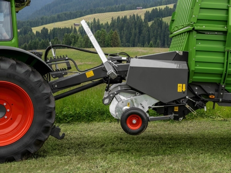 View of a Fendt Tigo forage wagon articulated drawbar for ground clearance when driving in and out of field and meadow paths.