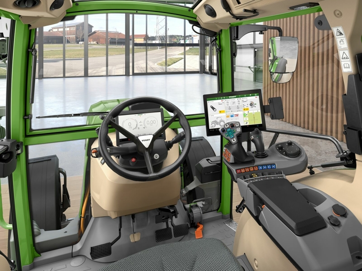 Interior view through the windscreen of a Fendt e100 Vario