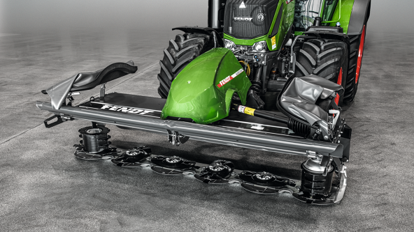 Front view of mower with front guard folded up for maintenance and cleaning