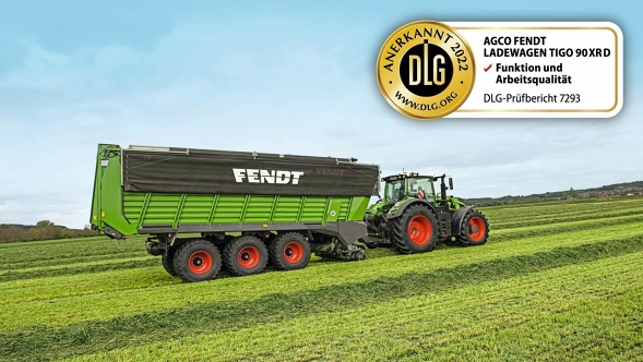 The DLG Seal of Approval on a picture of the Fendt Tigo, which is attached to the back of a Fendt tractor