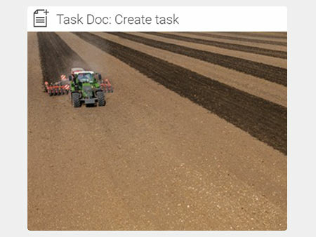 View tile of a tractor on a brown field