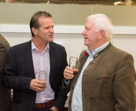 Two men drinking beer