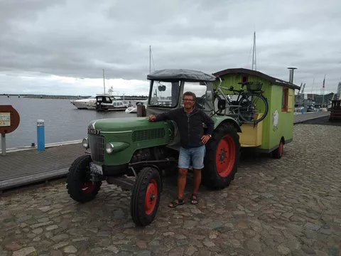 Despite the gathering clouds, there’s every reason to celebrate: Remigius Kirchmaier had reached his destination after 1,700 km. *