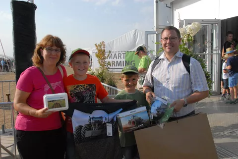 Family with various Fendt articles